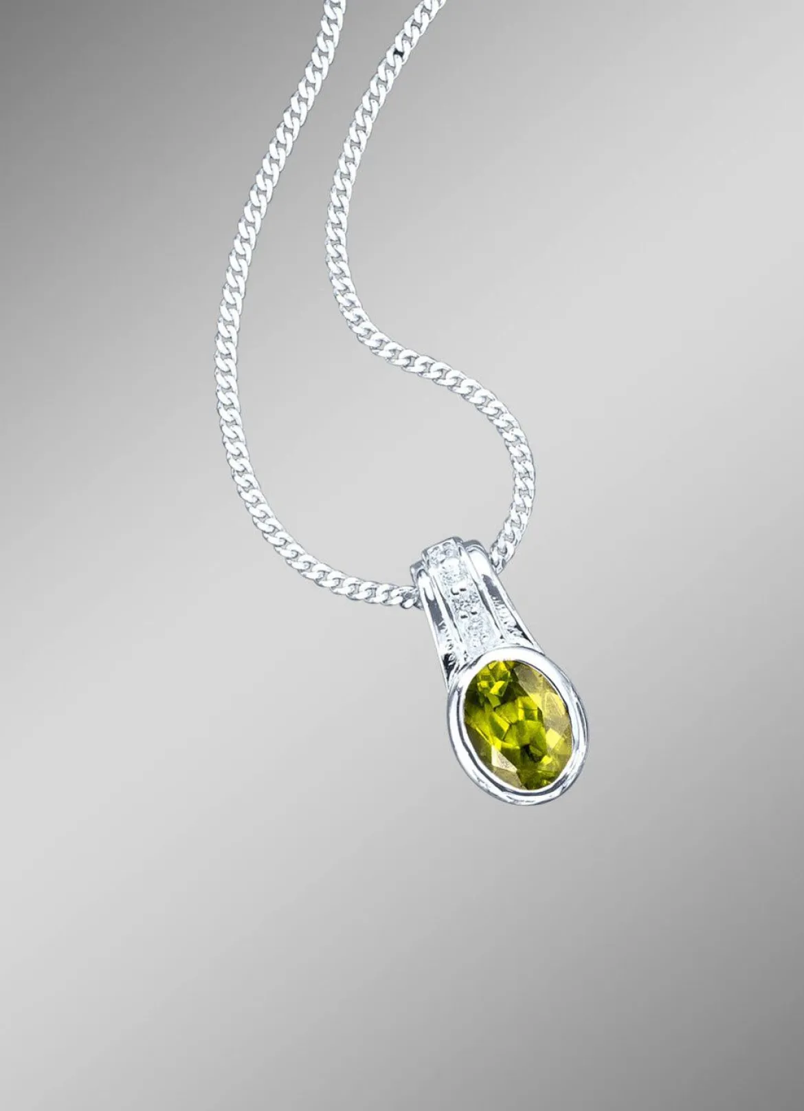 Anhänger mit echt Peridot und synth. Zirkonia