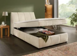 Boxspringbett mit Stauraum im Kopfteil und Bettkasten