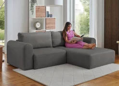 Polsterecke mit Bettfunktion und Dekokissen