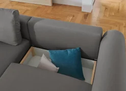 Polsterecke mit Bettfunktion und Dekokissen
