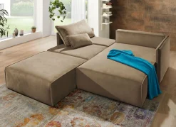 Polsterecke mit Bettfunktion und Hocker