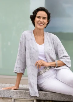 Strickjacke mit Mustermix im Wellendessin