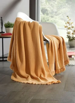 Wohndecke und Kissenbezug in toller Strickoptik