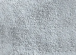 Wohndecke und Sesselschoner mit Fransenabschluss